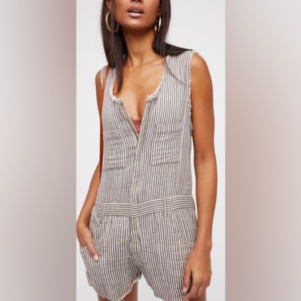 Free People zip up white and blue romper. Never worn!